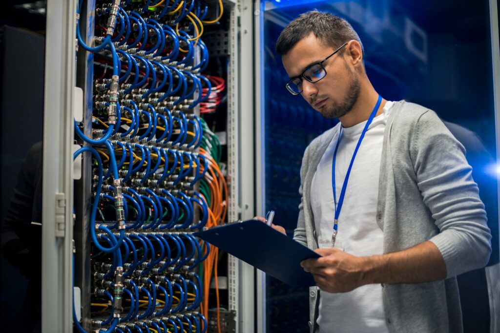 Young Man Working with servers